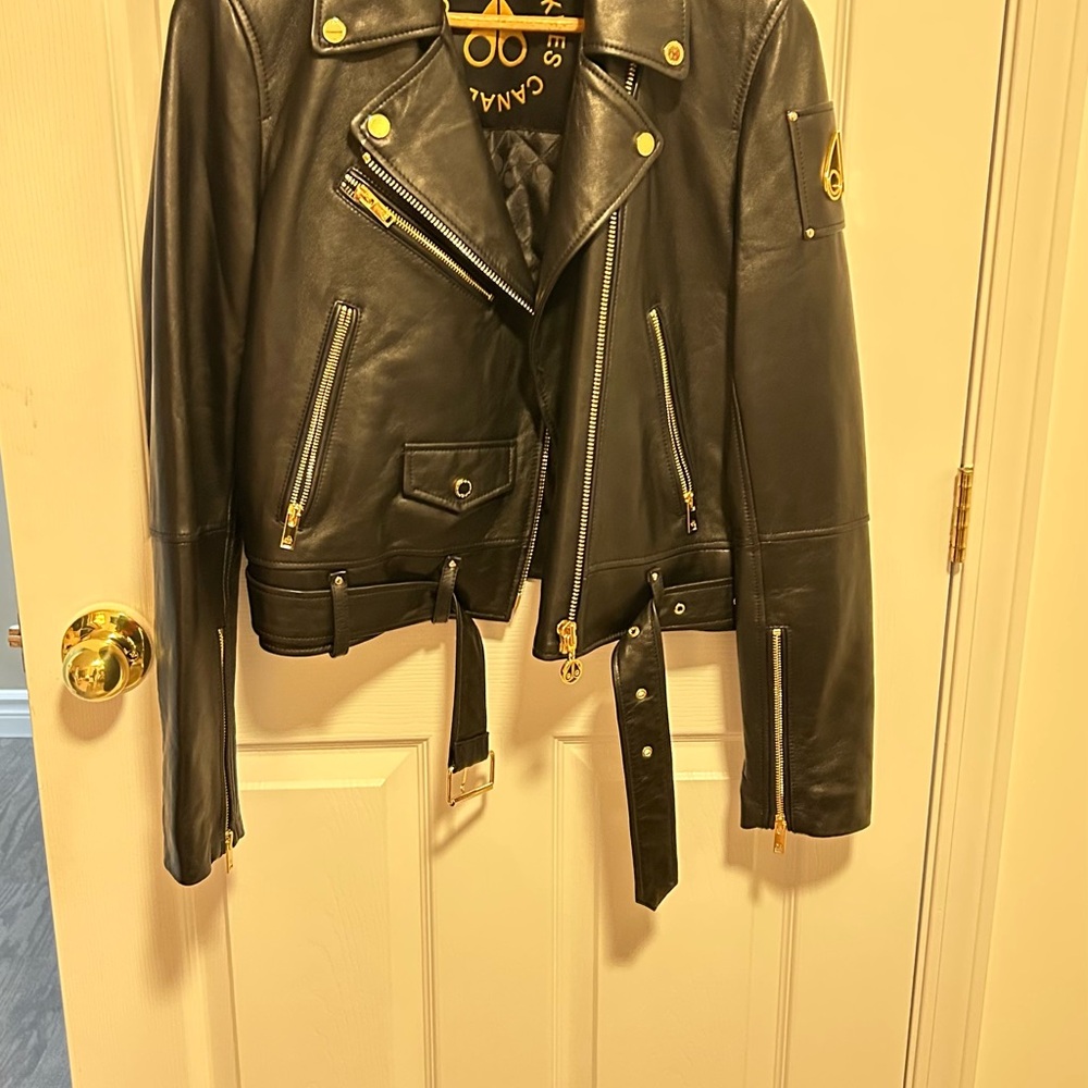 Chanel Black Leather Jacket with Gold Accents